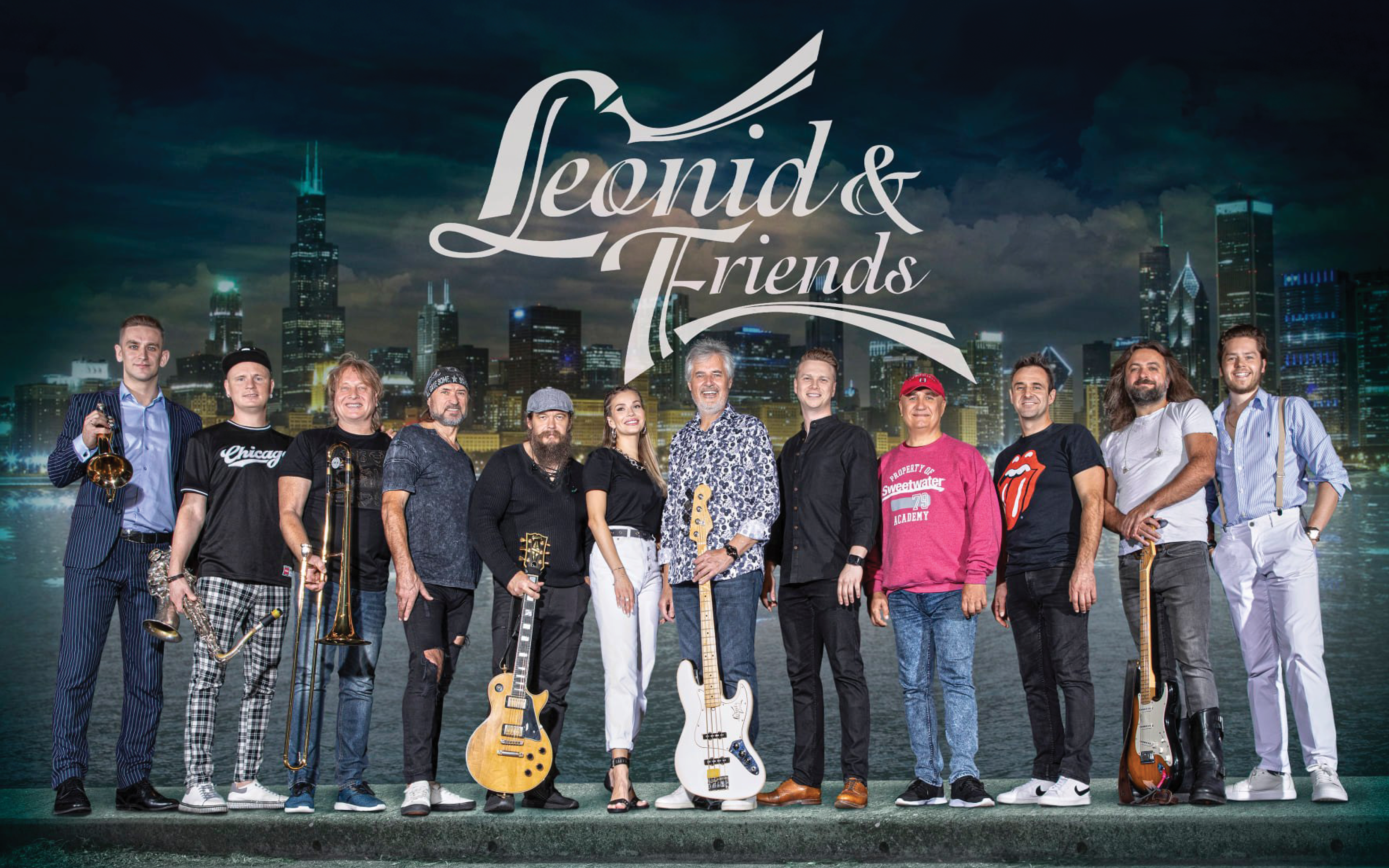 "Leonid & Friends". The band, Leonid & Friends posed together in front of skyline.