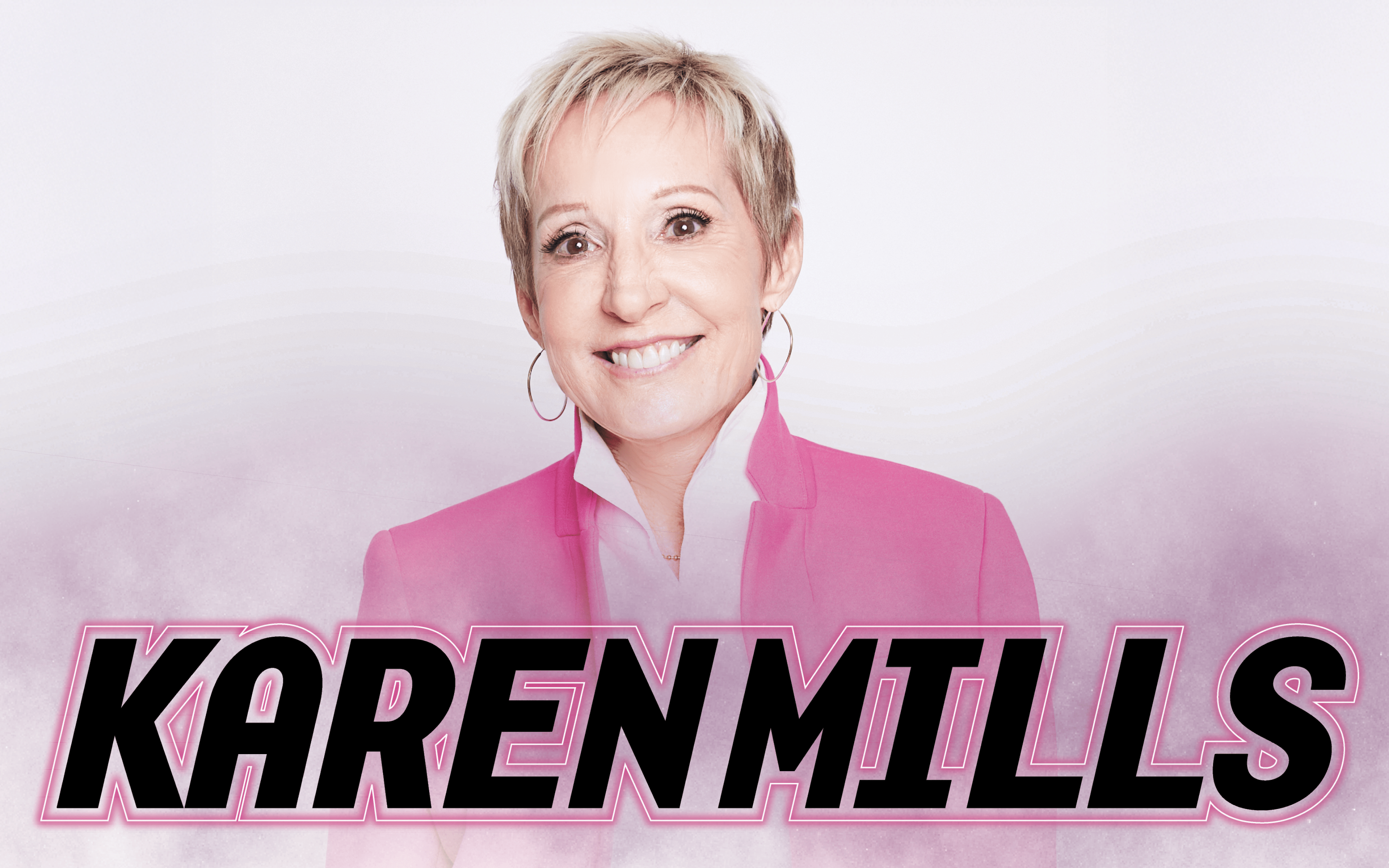 "Karen Mills" Posed smiling in a hot pink blazer.