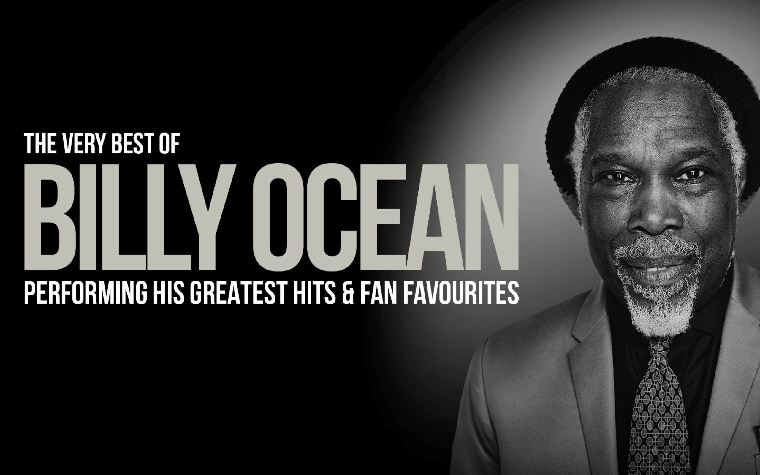 Black and white promotional image of Billy Ocean wearing a suit, tie, and hat, smiling at the camera. Large text on the left reads: “The Very Best of Billy Ocean – Performing His Greatest Hits & Fan Favourites.”