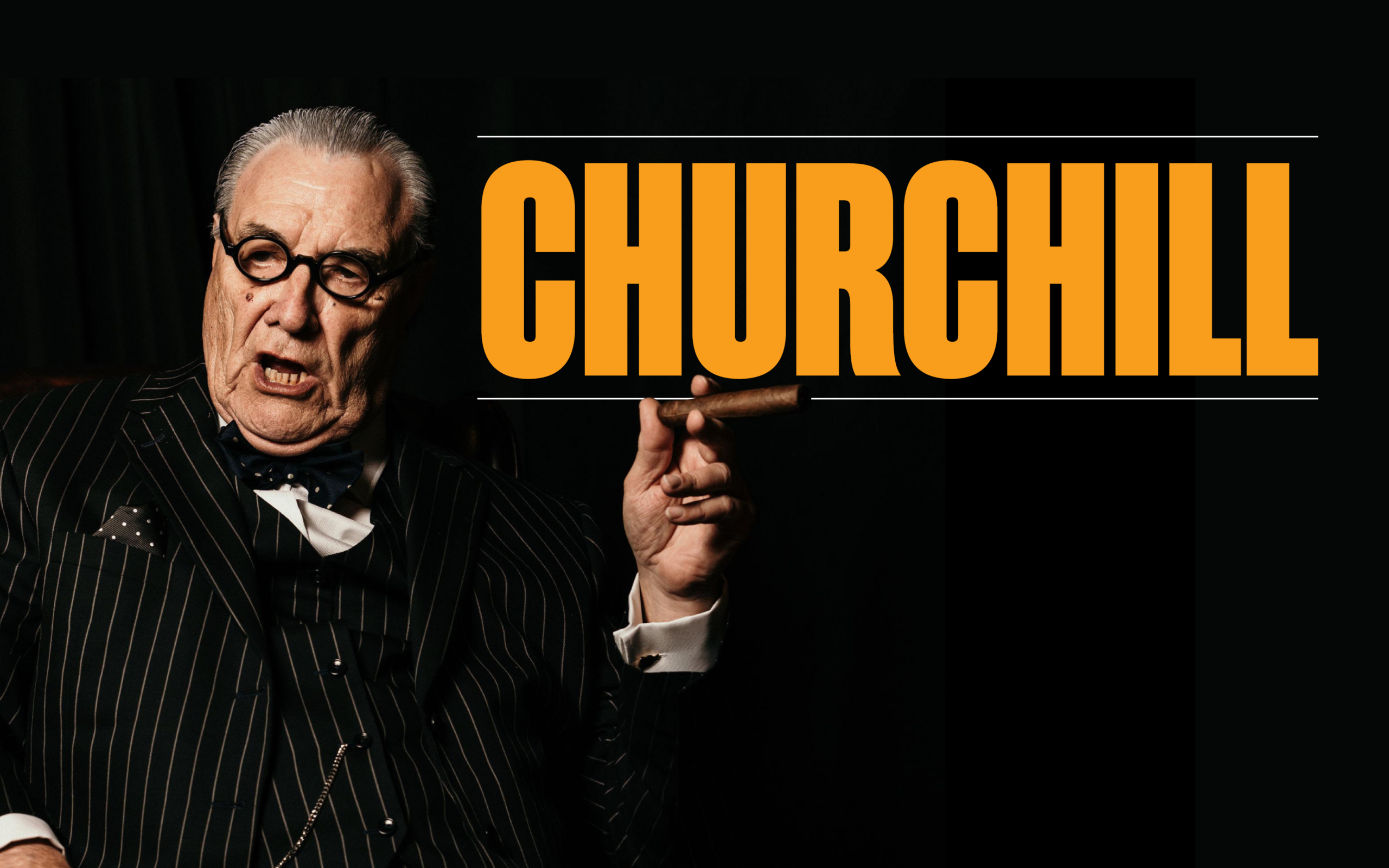 Promotional poster for CHURCHILL at The Tracy. Pictured is a man smoking a cigar against a black background. In a bright yellow/orange it reads "CHRUCHHILL."
