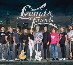 "Leonid & Friends". The band, Leonid & Friends posed together in front of skyline.